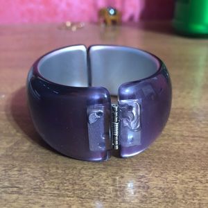 Purple bracelet.